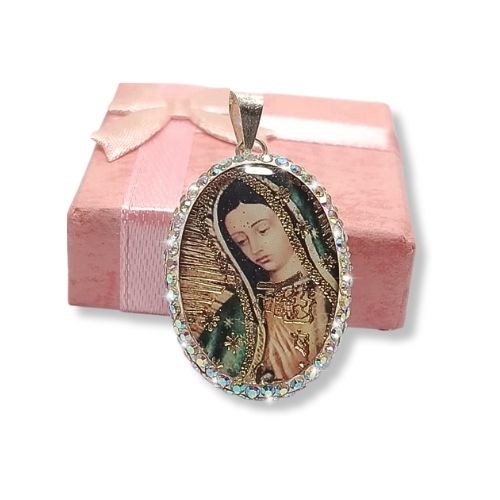 Dije encapsulado de la virgencita doble vista