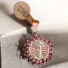Dije de la virgencita con bordes de circonia rosa